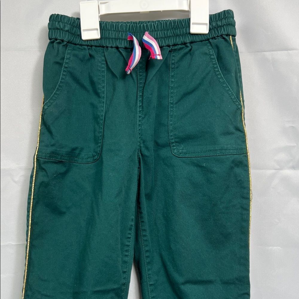 Boden green joggers with gold metallic trim size 10y